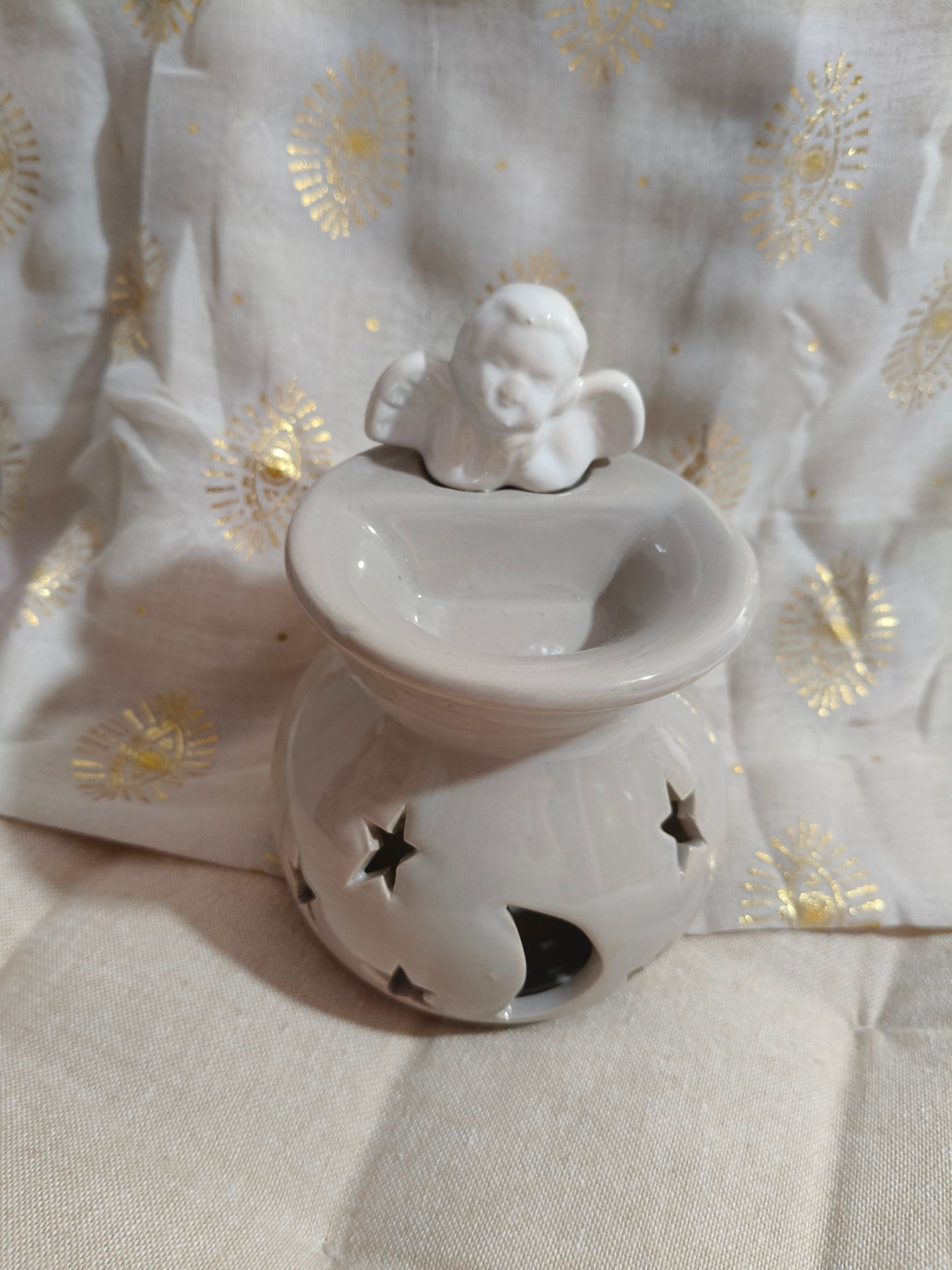 Quemador de color crema con ángel 00464