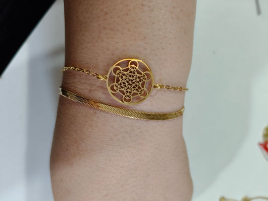Doble pulsera de Metratón dorada